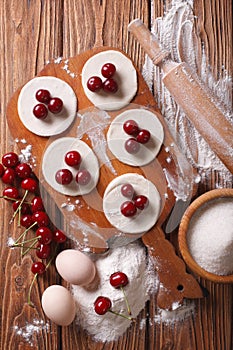 Preparation of ingredients for dumplings with cherries