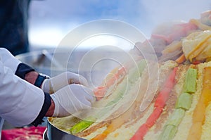 Preparation of a large couscous outdoors. Moroccan festival