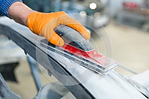 preparation for painting a car bumper