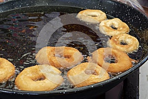 Preparation of pancake donuts, typical of Amorebieta, Biscay, Spain
