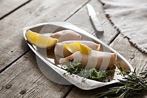 Preparation of raw squid and ingredients on the table