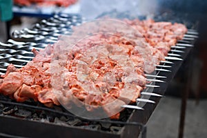 Preparation of shish kebab bbq. Shish kebab on skewers.