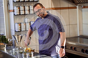 Preparation souse in restaurant kitchen