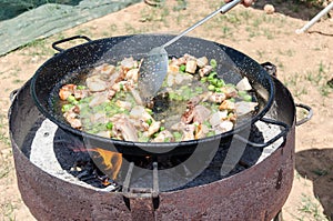 Preparation step of authentic Paella Valenciana photo