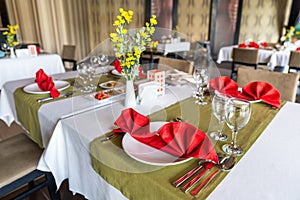 Preparation of table settings in a luxurious A la carte restaurant