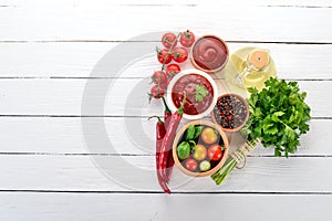 Preparation of tomato sauces and seasonings.