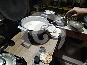 Preparation of Traditional Bengali Chitoi Pitha (Ashke Pithe)