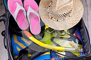 Preparation travel suitcase with accessories for snorkeling