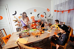 Preparations for autumn holidays doing craft with kids