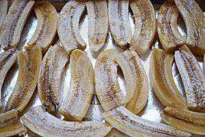 Prepared bananas in a baking tray