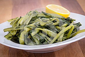 Prepared boiled dandelion greens bowl