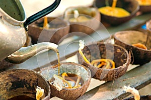 Prepared candle and old coconut shell for Loy kratong festival