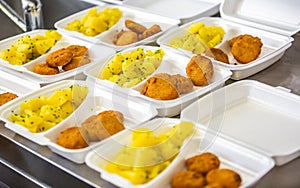 Prepared dish or food at the restaurant in the plastic box for delivery to home, online ordering, take away concept