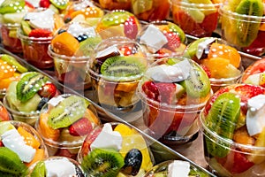 Prepared fruit pots for sale at a market stall in La Boqueria, Barcelona City