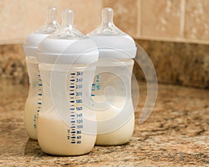 Prepared infant formula in bottles