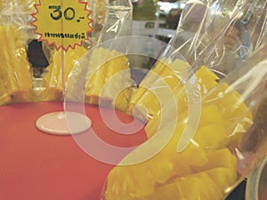 Prepared sweet ripe pineapple in plastic bags