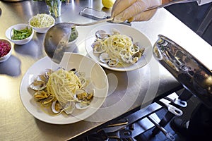 Preparetion dish of spaghetti with clams photo
