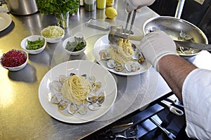 Preparetion dish of spaghetti with clams photo