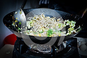 Preparing Asian food in an outdoor kitchen