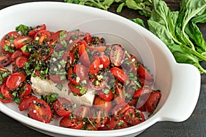 Preparing Baked Feta with Grape Tomatoes and Fresh Herbs