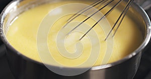 Preparing bechamel sauce boiling butter