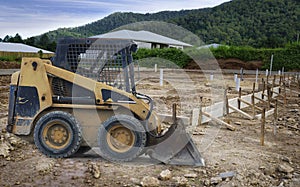 Preparing a building site doing the foundations