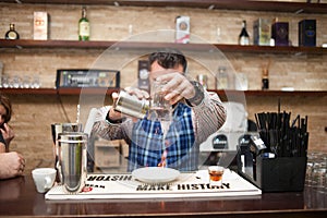 Preparing a cocktail with fire