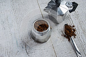 Preparing the coffee in a moka - italian coffee maker