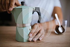 Preparing Coffee In A Moka Pot