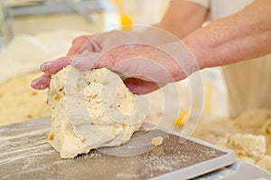 Preparing dough in a bakery.