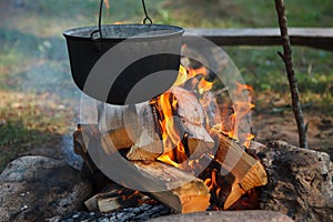 Preparing food on campfire