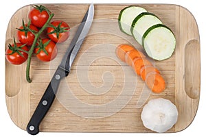 Preparing food, slicing vegetables knife on cutting board