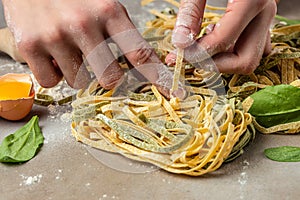 preparing fresh homemade pasta tagliatelle. Food recipe background. Close up