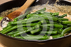 Preparing green beans to make a casserole