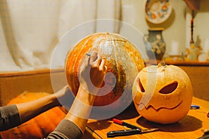 Preparing halloween pumpkins for carving.