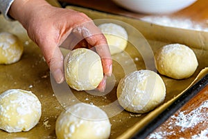 Preparing home made yeast buns