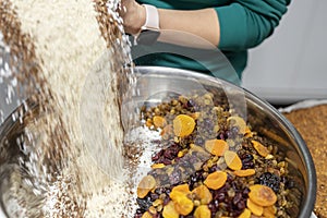 Preparing homemade muesli mix