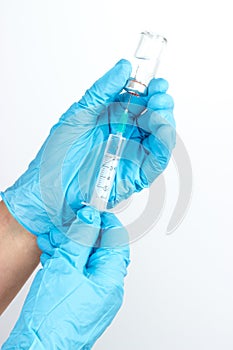 Preparing injection with syringe and vial