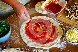 Preparing the Italian pizza