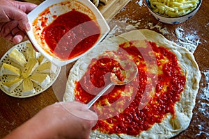 Preparing the Italian pizza