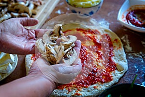 Preparing the Italian pizza