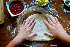 Preparing the Italian pizza