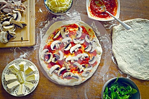 Preparing the Italian pizza