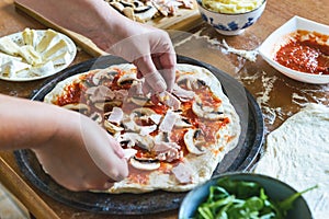 Preparing the Italian pizza