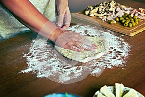 Preparing the Italian pizza