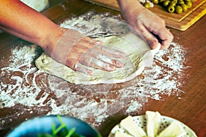 Preparing the Italian pizza