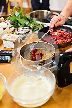 Preparing lemon curd cheesecake