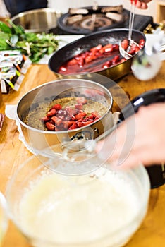 Preparing lemon curd cheesecake
