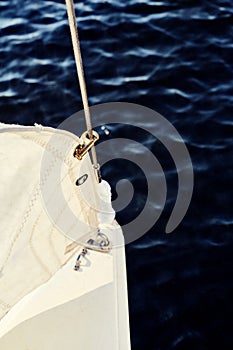 Preparing before lifting staysail sails.