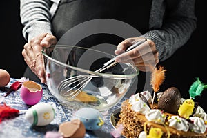 Preparing a mona de pascua, a Spanish Easter cake photo